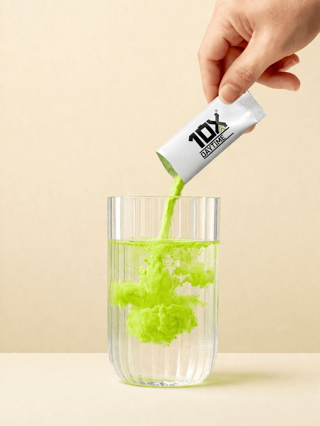 Pouring 10X into a glass